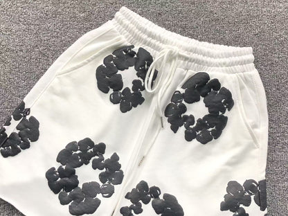 Completo corto con strappi in denim