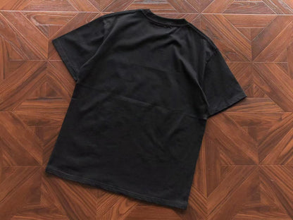 Maglietta con lacrime di denim 