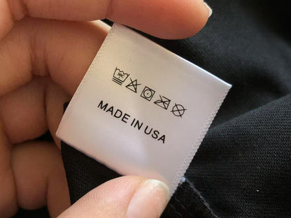 Maglietta con lacrime di denim 