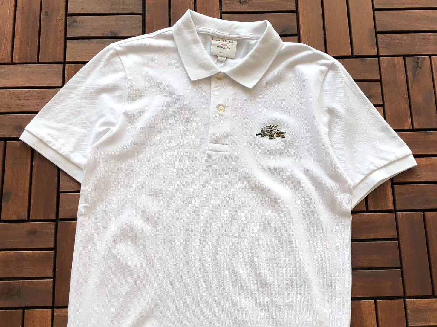 Collezione Polo Lacoste x Netflix