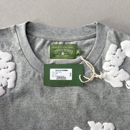 Maglietta con lacrime di denim 