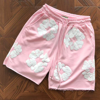 Pantaloncini con strappi in denim 