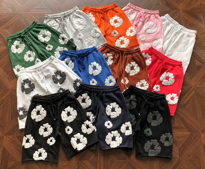 Pantaloncini con strappi in denim 