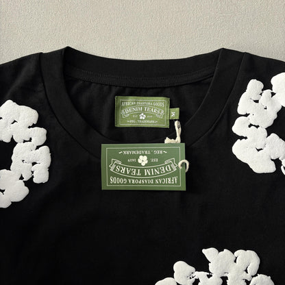 Maglietta con lacrime di denim 