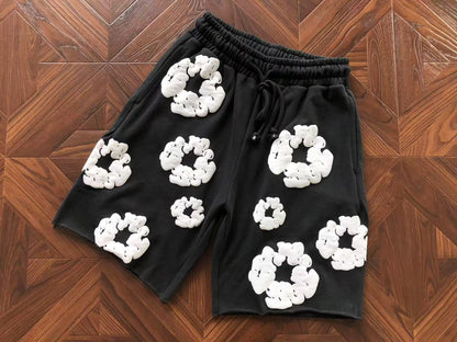 Pantaloncini con strappi in denim 