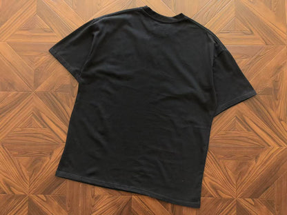 Maglietta con lacrime di denim 