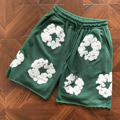 Pantaloncini con strappi in denim 