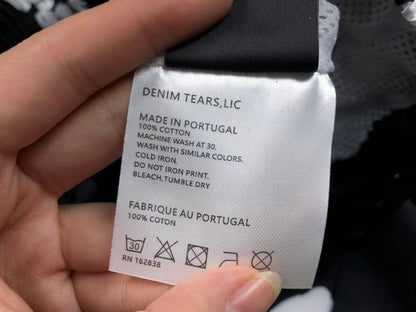 Tuta da bagno con strappi in denim