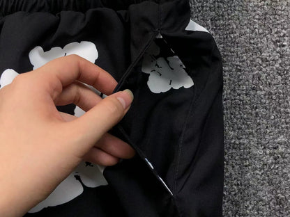 Tuta da bagno con strappi in denim