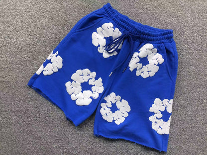 Completo corto con strappi in denim