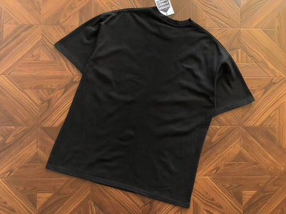 Maglietta con lacrime di denim 