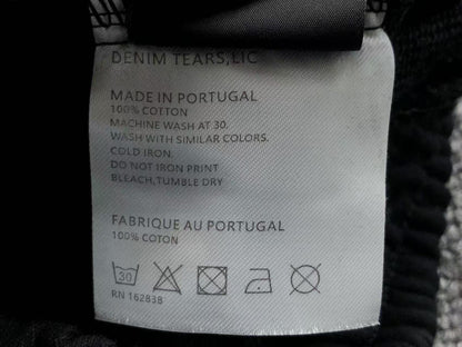 Completo corto con strappi in denim