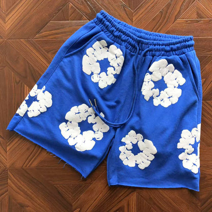 Pantaloncini con strappi in denim 