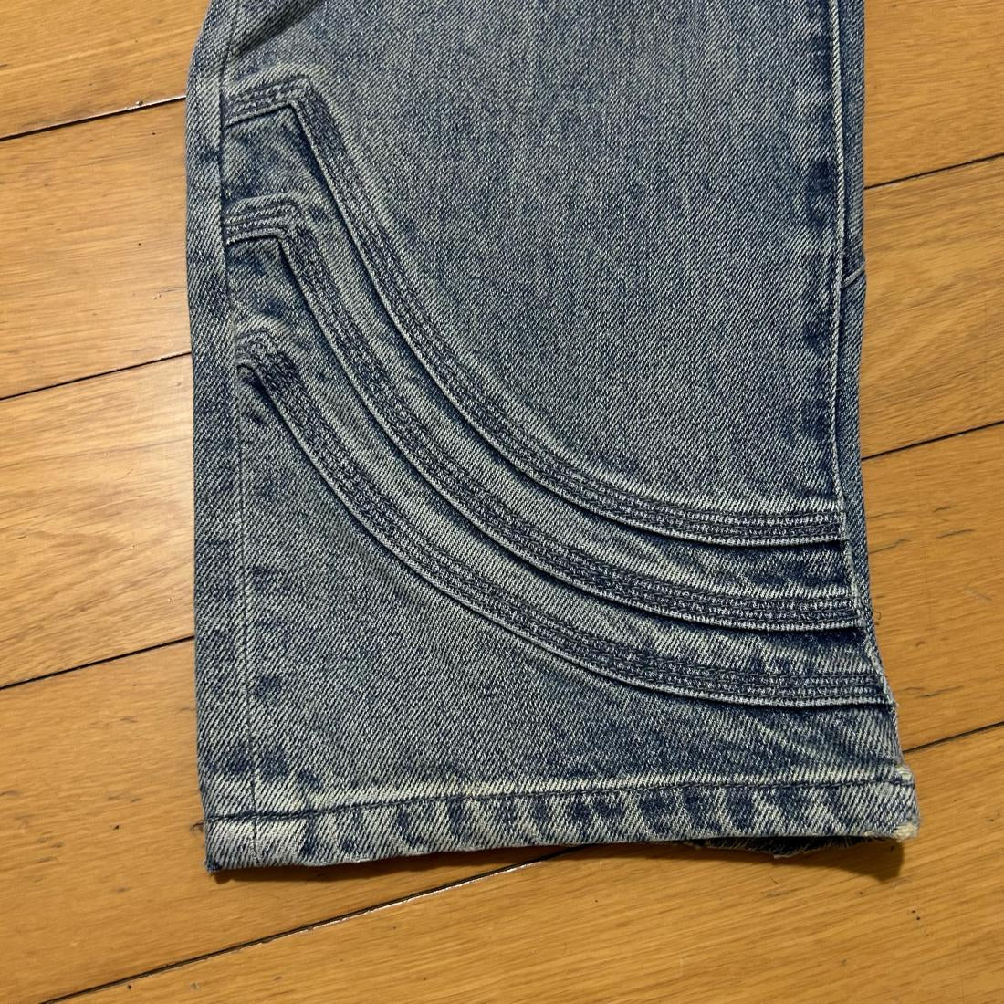 Locker geschnittene Jeans mit Supreme-S-Logo
