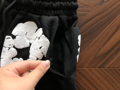 Pantaloncini con strappi in denim 