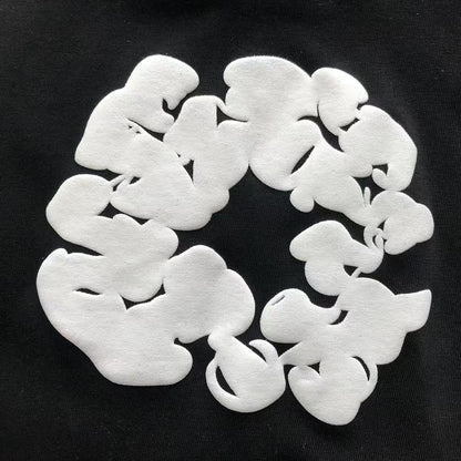 Maglietta con lacrime di denim 