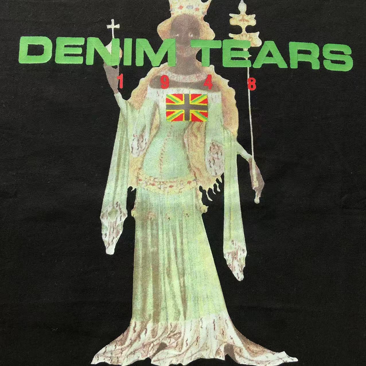 Maglietta con lacrime di denim 