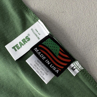 Maglietta con lacrime di denim 