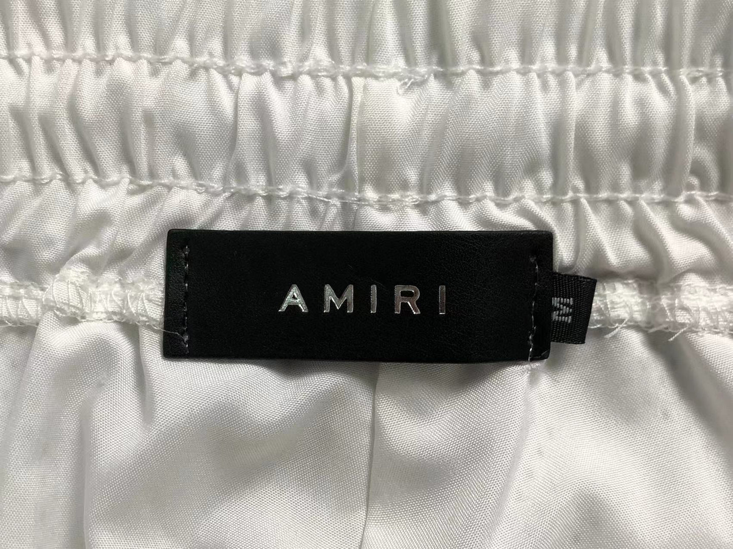Pantaloncini e maglietta Amiri