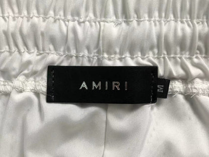 Pantaloncini e maglietta Amiri