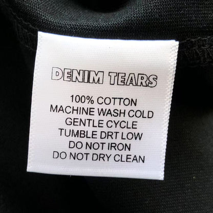 Maglietta con lacrime di denim 