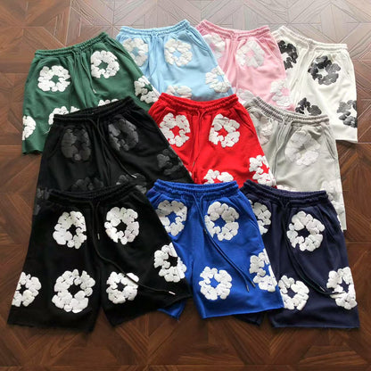 Pantaloncini con strappi in denim 