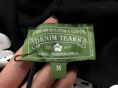 Il denim strappa la ghirlanda di cotone