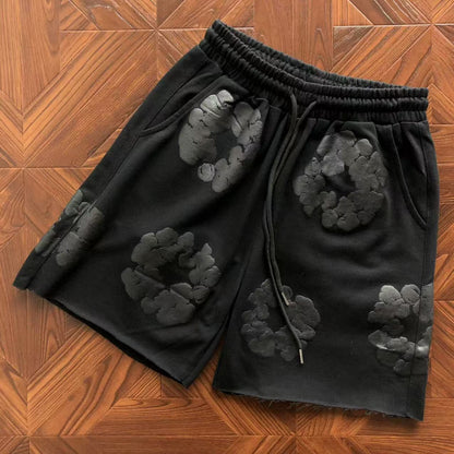 Pantaloncini con strappi in denim 