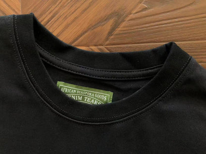 Maglietta con lacrime di denim 