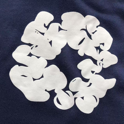 Maglietta con lacrime di denim 