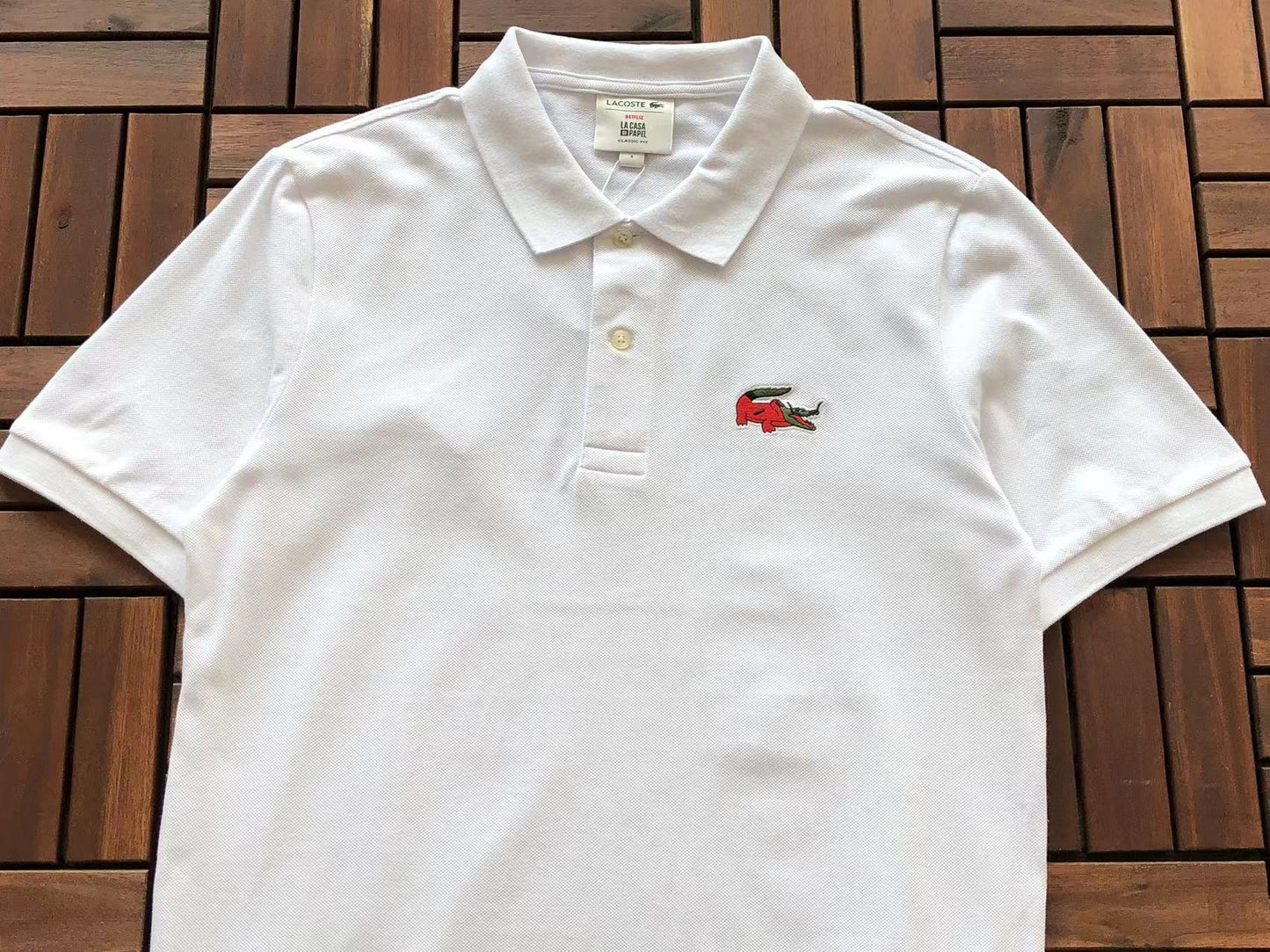 Collezione Polo Lacoste x Netflix