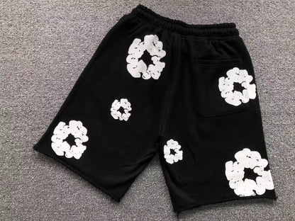 Pantaloncini con strappi in denim