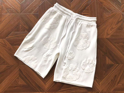 Pantaloncini con strappi in denim 