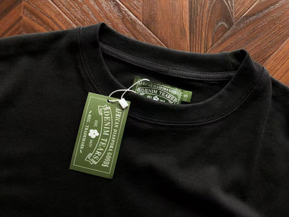 Maglietta con lacrime di denim 