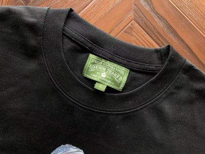 Maglietta con lacrime di denim 