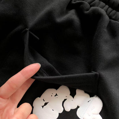 Pantaloncini con strappi in denim 