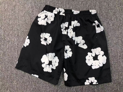 Tuta da bagno con strappi in denim