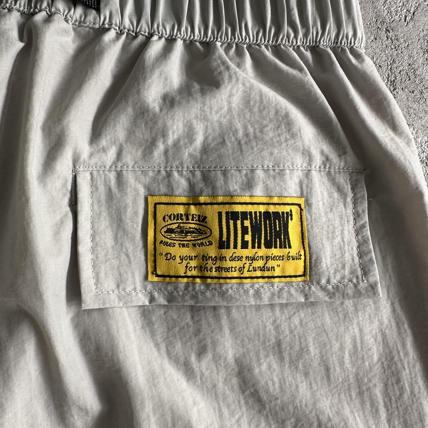 Pantaloncini da corsa e pioggia Corteiz