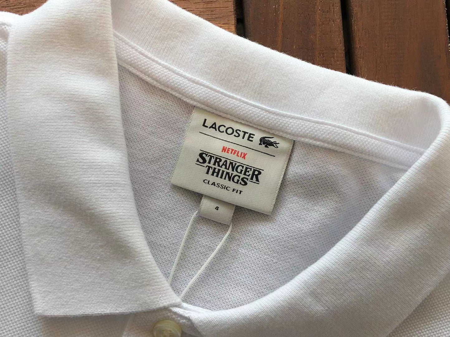 Collezione Polo Lacoste x Netflix
