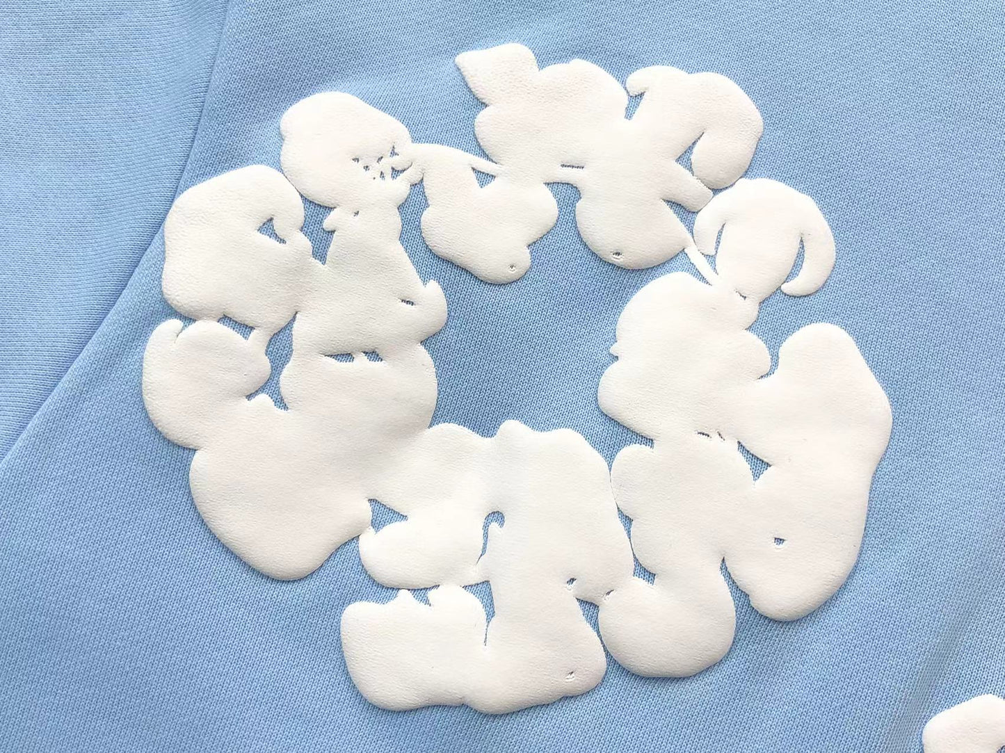 Il denim strappa la ghirlanda di cotone