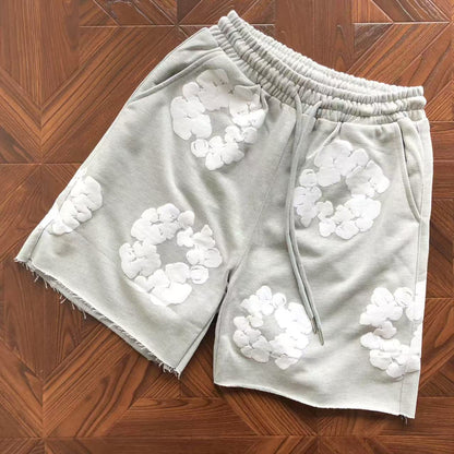 Pantaloncini con strappi in denim 