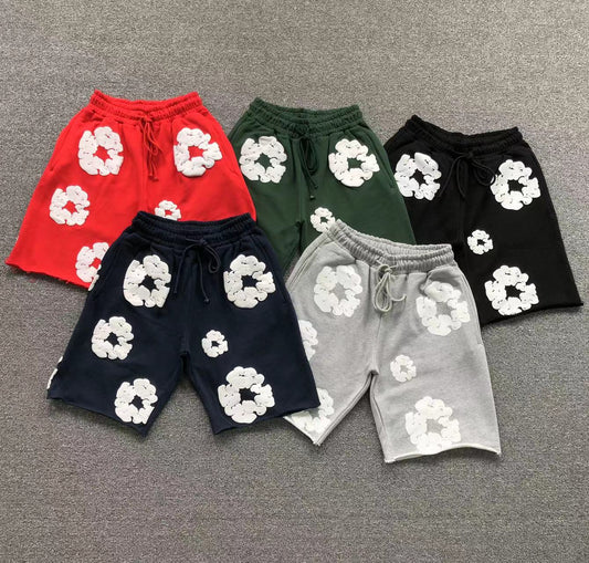 Pantaloncini con strappi in denim