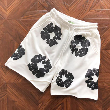 Pantaloncini con strappi in denim 