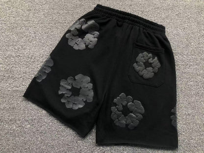 Completo corto con strappi in denim