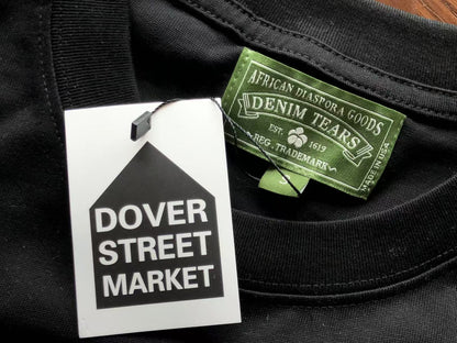 Maglietta con lacrime di denim 