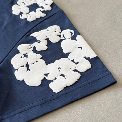 Maglietta con lacrime di denim 