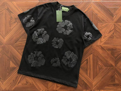 Maglietta con lacrime di denim 