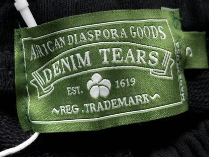 Maglietta con lacrime di denim