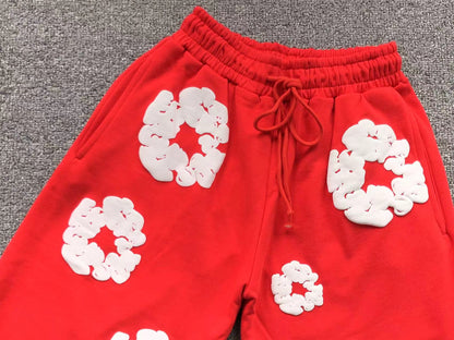 Pantaloncini con strappi in denim