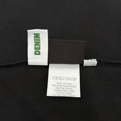 Maglietta con lacrime di denim 